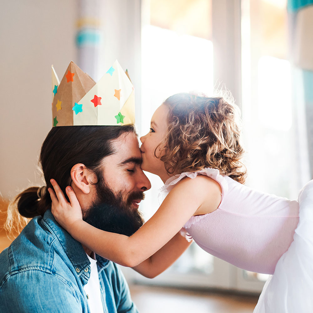 dad and daughter playing dress up