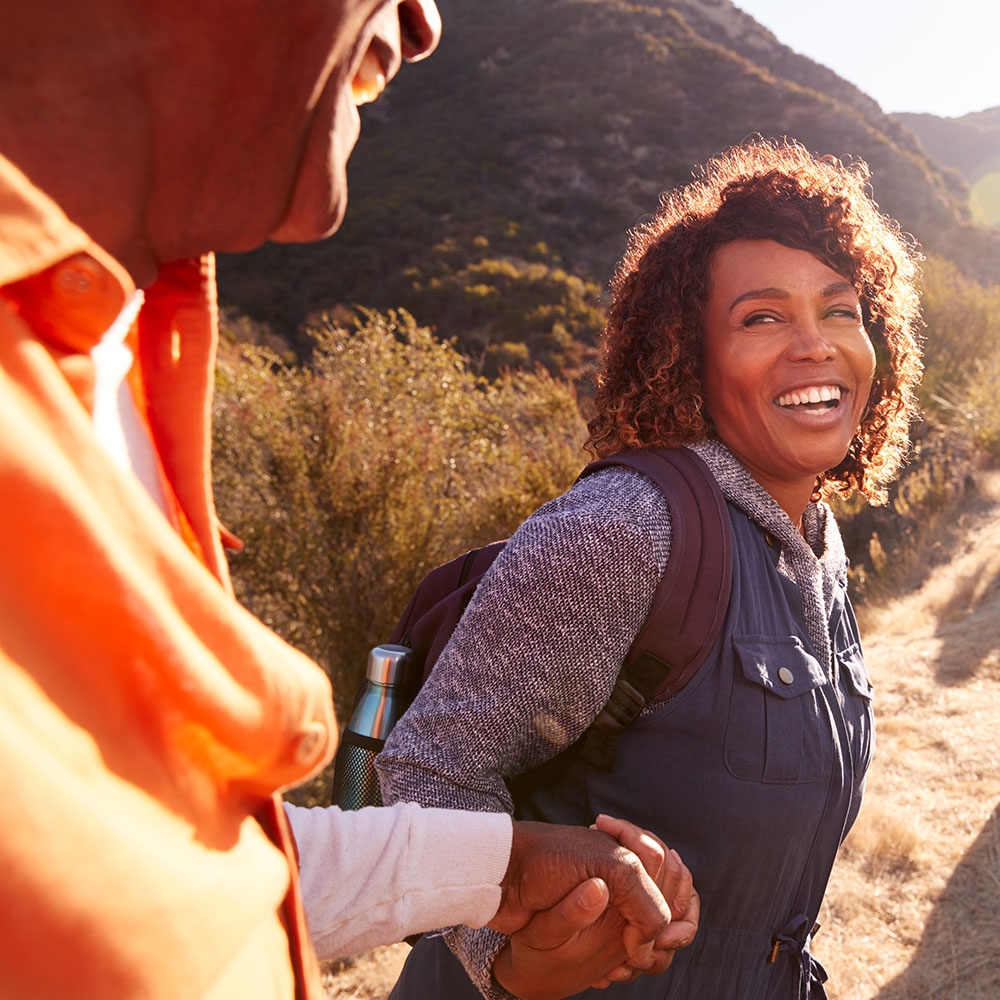 Mature woman and man on a hike