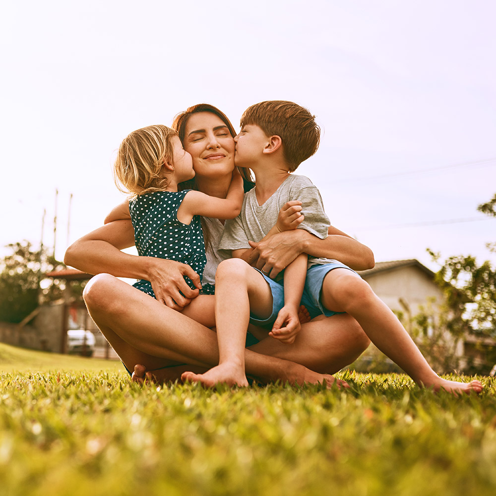 mother with children in yard
