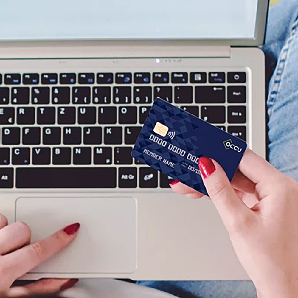 Woman with an OCCU Debit Card