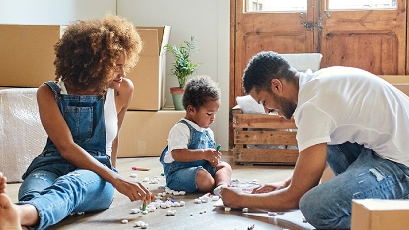 Couple paying with their kid