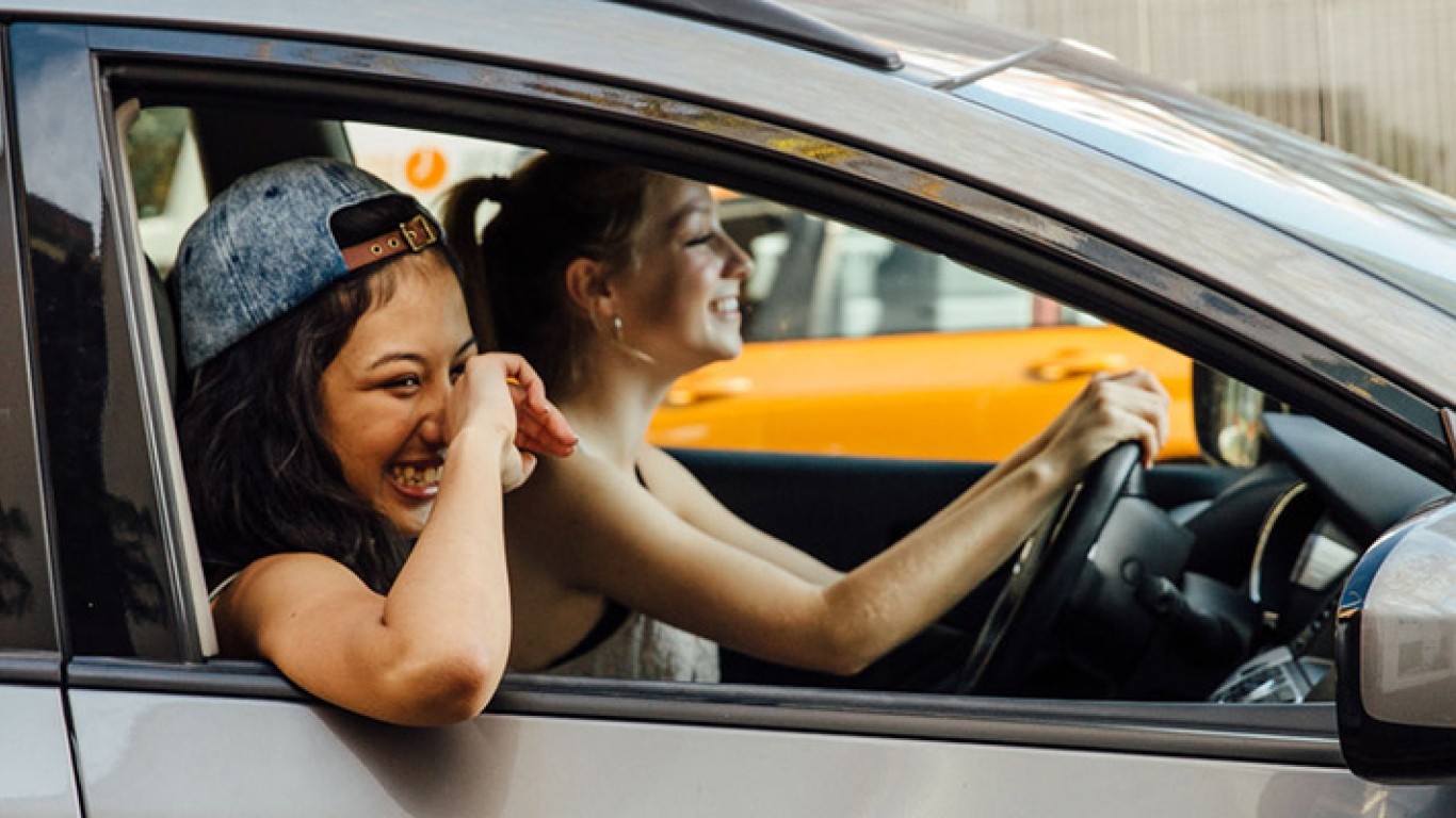 Two girls driving a car