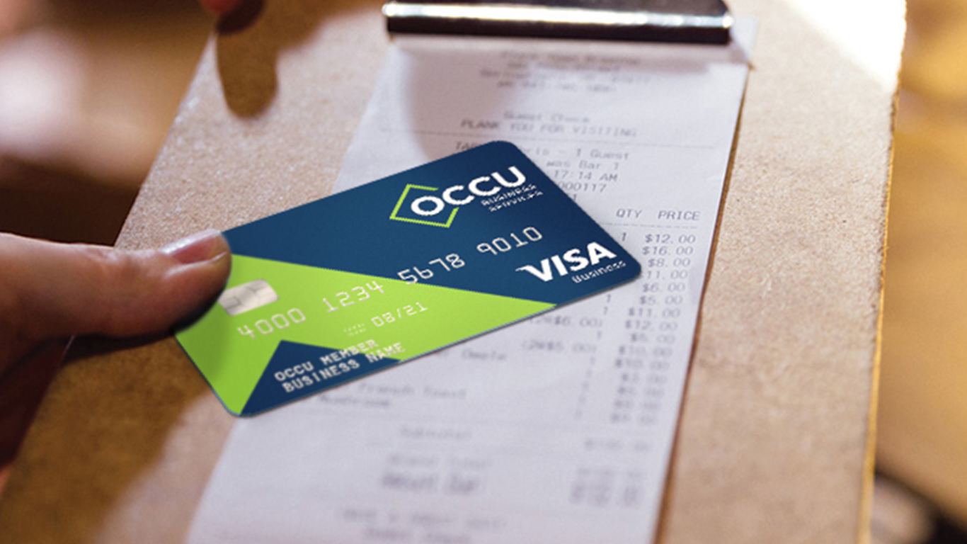 Man paying with OCCU credit card.