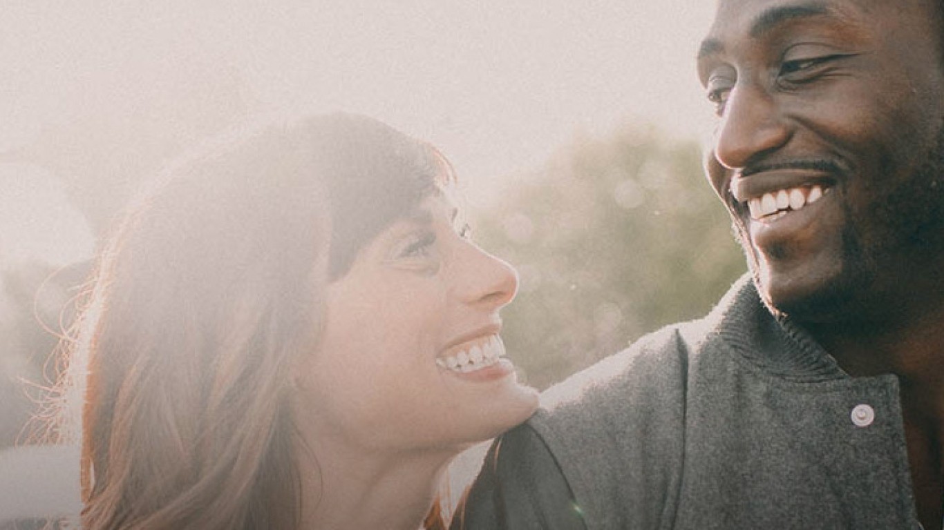 A couple looking at eachother and smiling