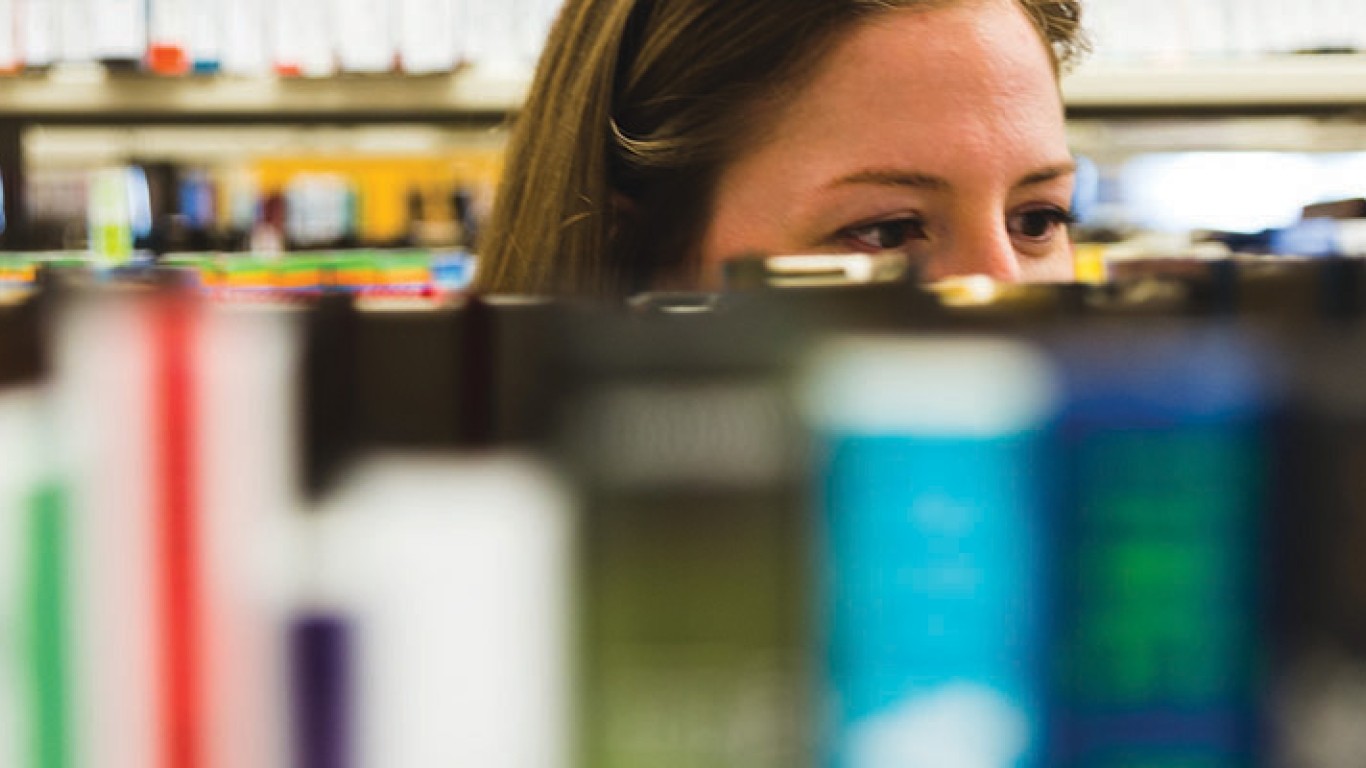 woman looking at books