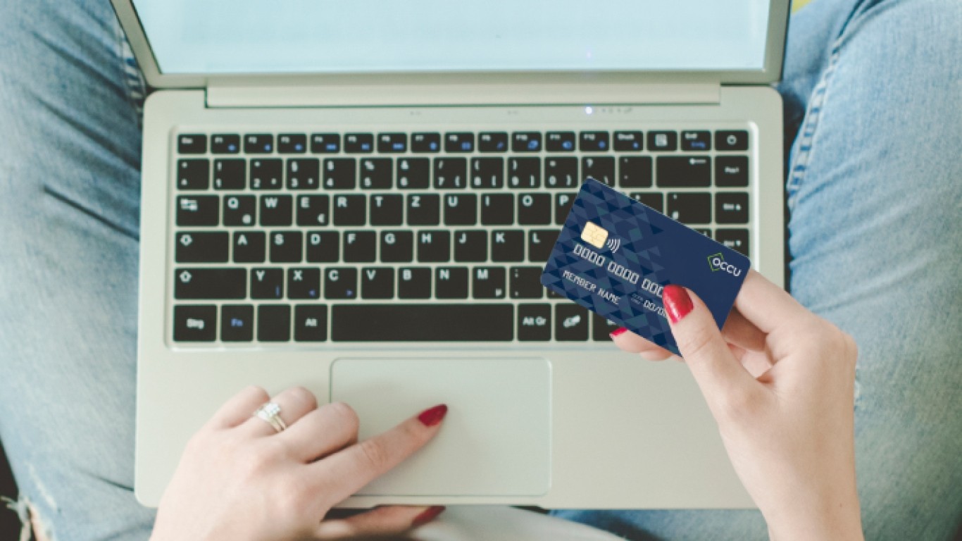 Person holding debit card