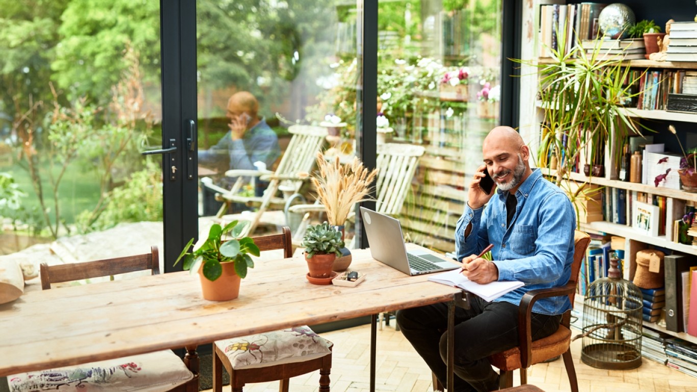Happy business man on phone 