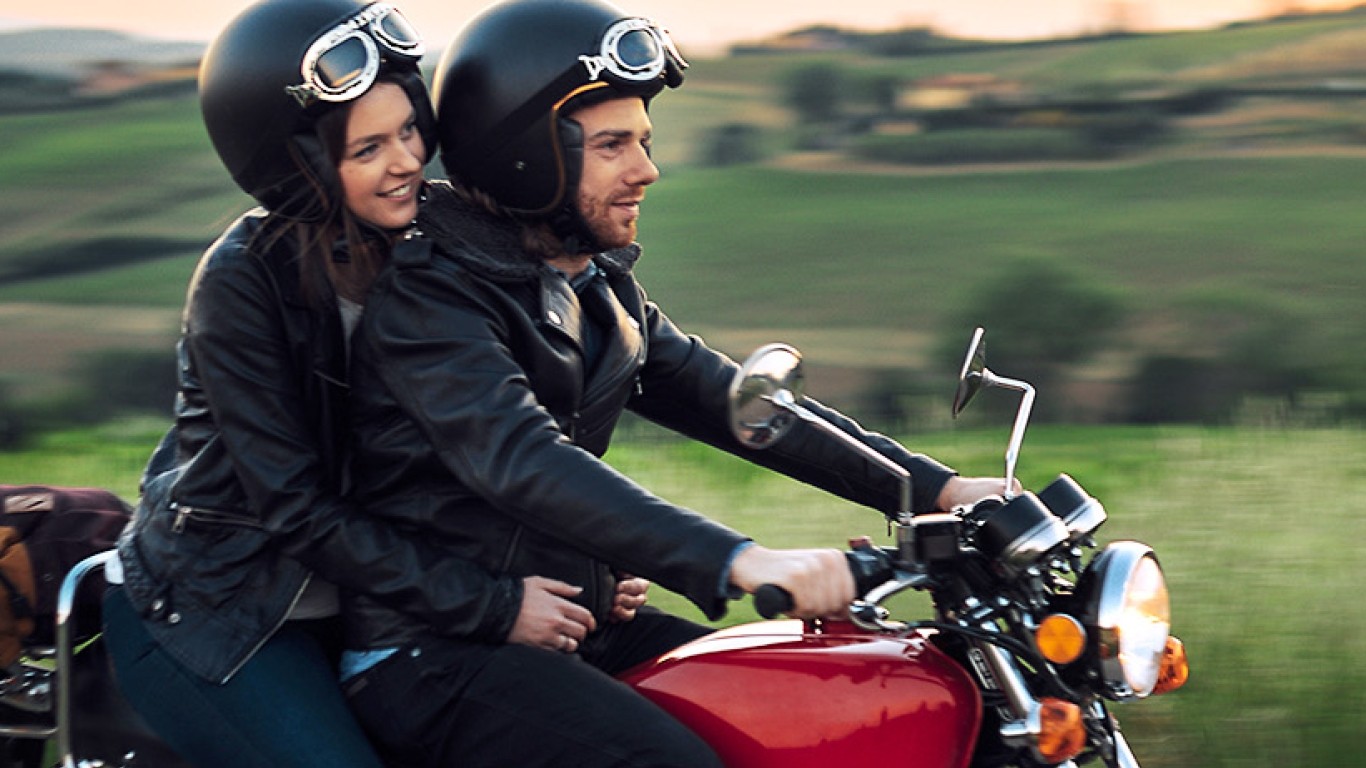 couple on vintage motorbike