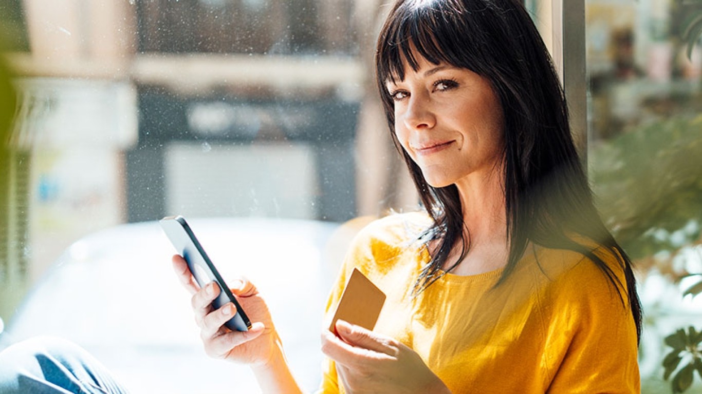 woman in shop with credit card