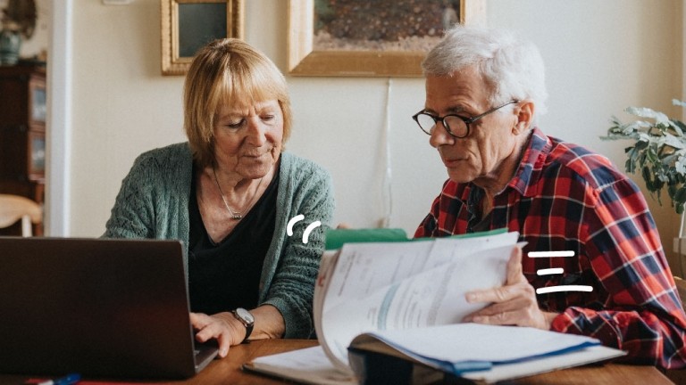 A couple looks over financial paperwork