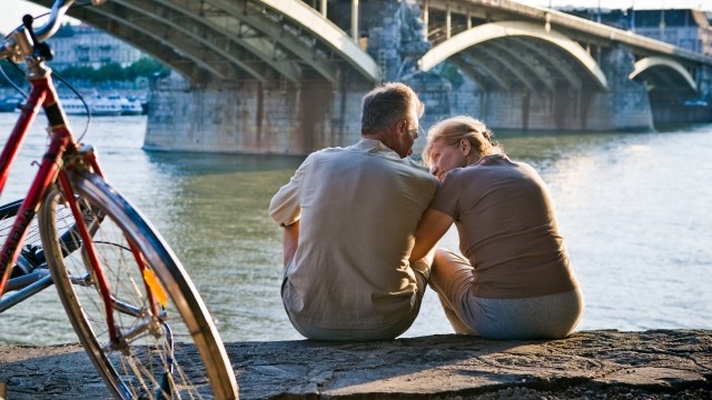 Couple under bridge