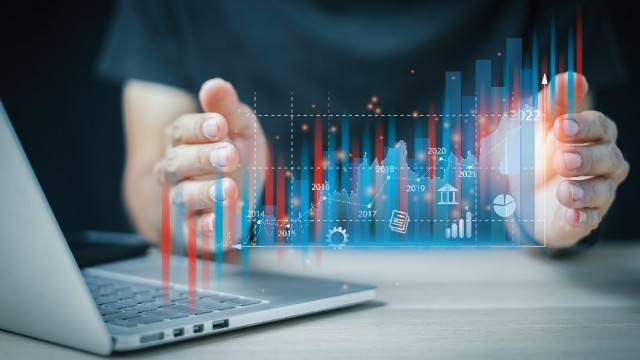 Person using futuristic graph