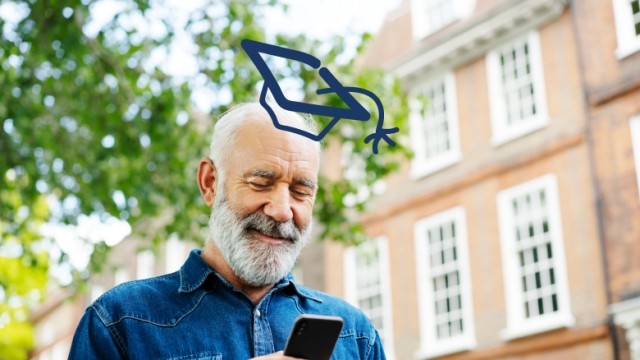 Older man with doodle of grad cap