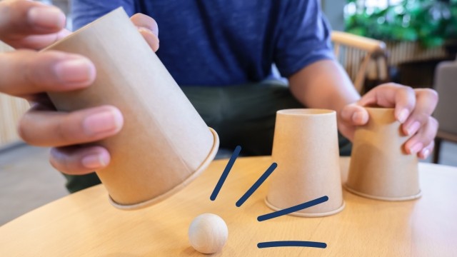 Game of find the ball with cups