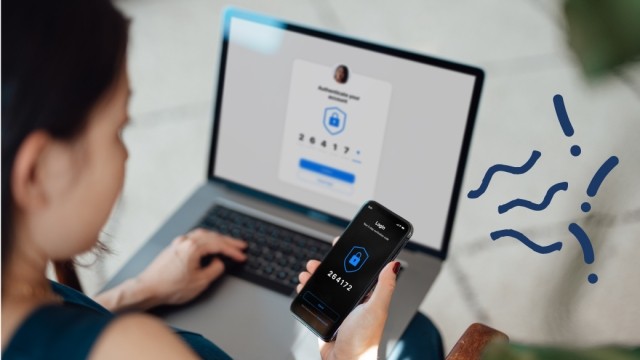 Woman holding a phone with squiggles in the air around it.