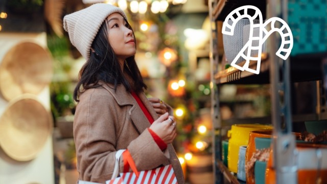 Woman shops for gifts during the holiday season