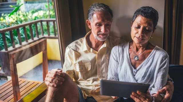 Couple looking at an tablet