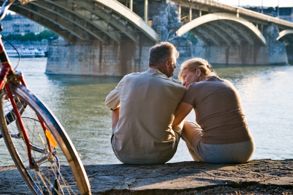 Couple under bridge
