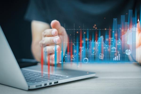 Person using futuristic graph 