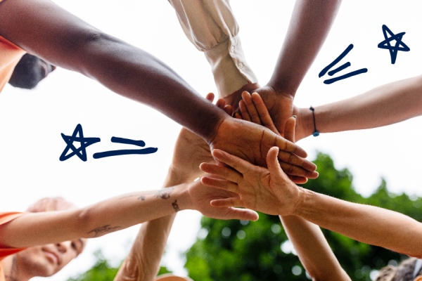 All hands in the middle with doodles. 