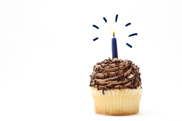 Cupcake with a birthday candle. 