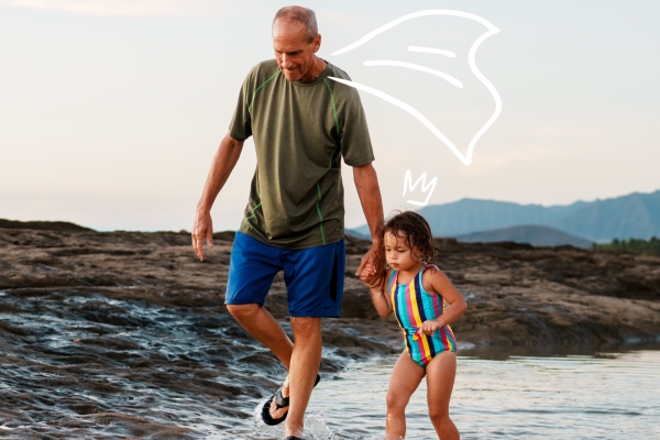 Man walking with little girl, holding hands