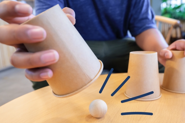 Game of find the ball with cups