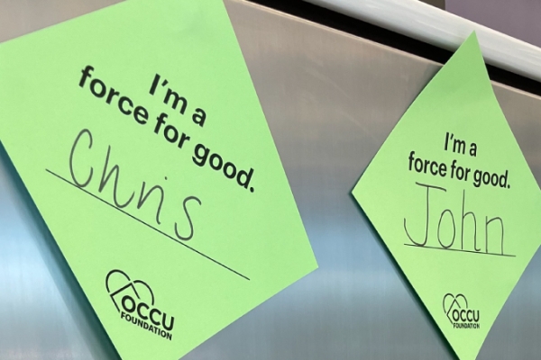 Green diamonds with "I'm a force for good" message and handwritten names