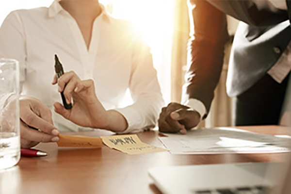 two people working at a table