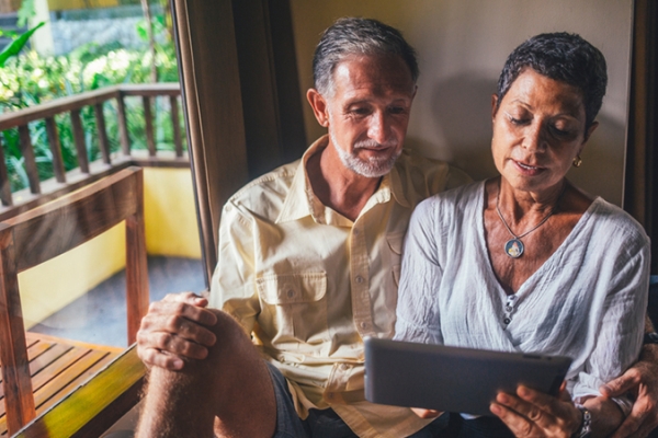 Couple looking at an tablet