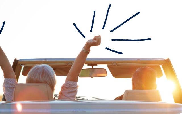 Couple cheering in car