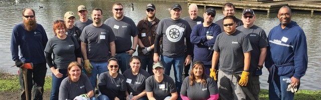 group of volunteers posing after job well done