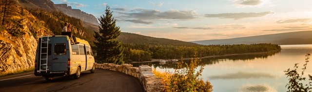 RV overlooking mountain lake