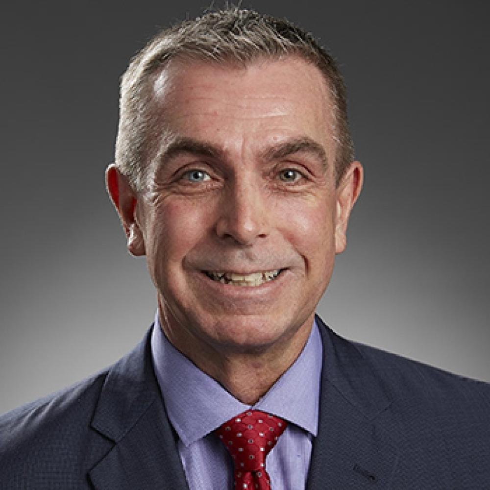 Ron Neumann CEO of OCCU