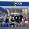 People in front of OCCU HQ