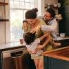 family playing in kitchen